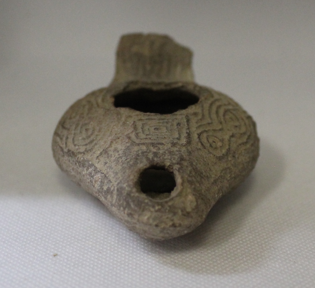 terracotta oil lamp